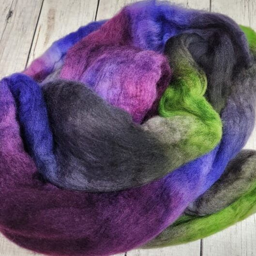 20231003_184518 Purple, green, and blue wool roving.