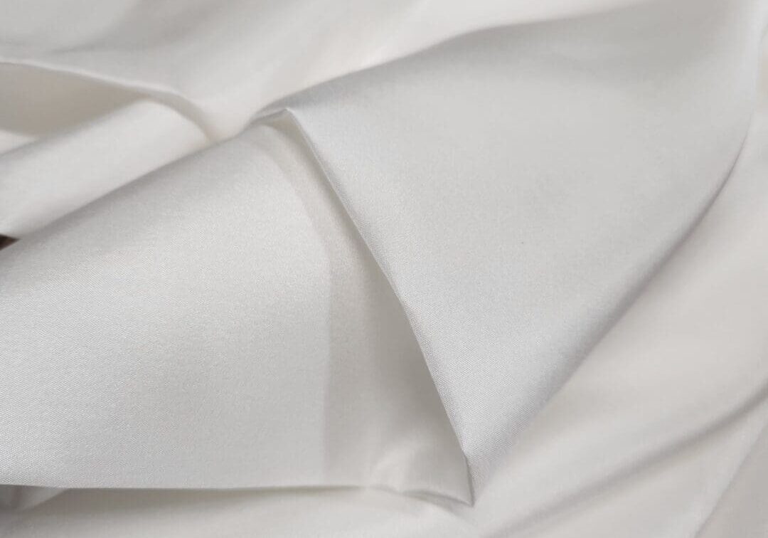 20231218_145149 A close up of a white piece of fabric.
