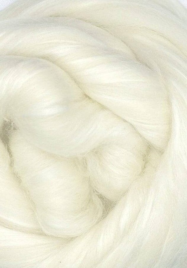 merinobamboo A close up of a white roving on a white surface.